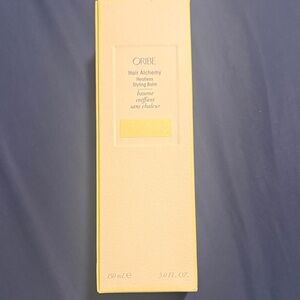 Oribe Hair Alchemy Styling Balm in Yellow Packaging